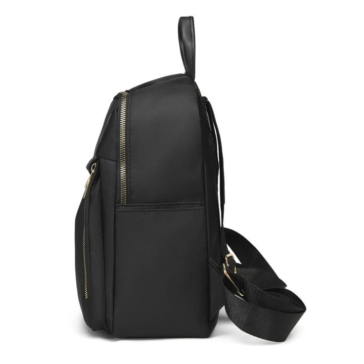 Women's black PU leather backpack, an elegant and practical everyday bag.