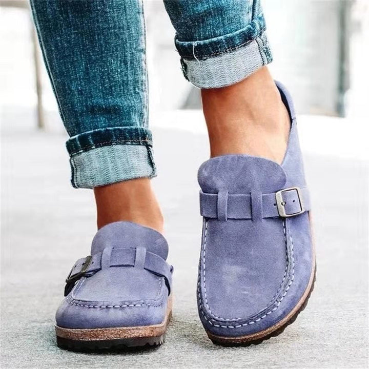 Close-up of a women's chic slip-on loafer, highlighting the material and design for spring.