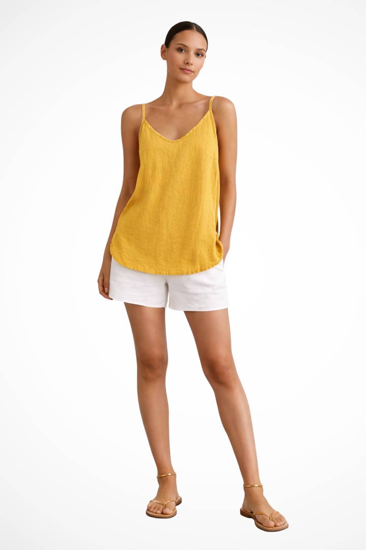 Lightweight women's spaghetti strap top with a relaxed fit, ideal for casual summer fashion.