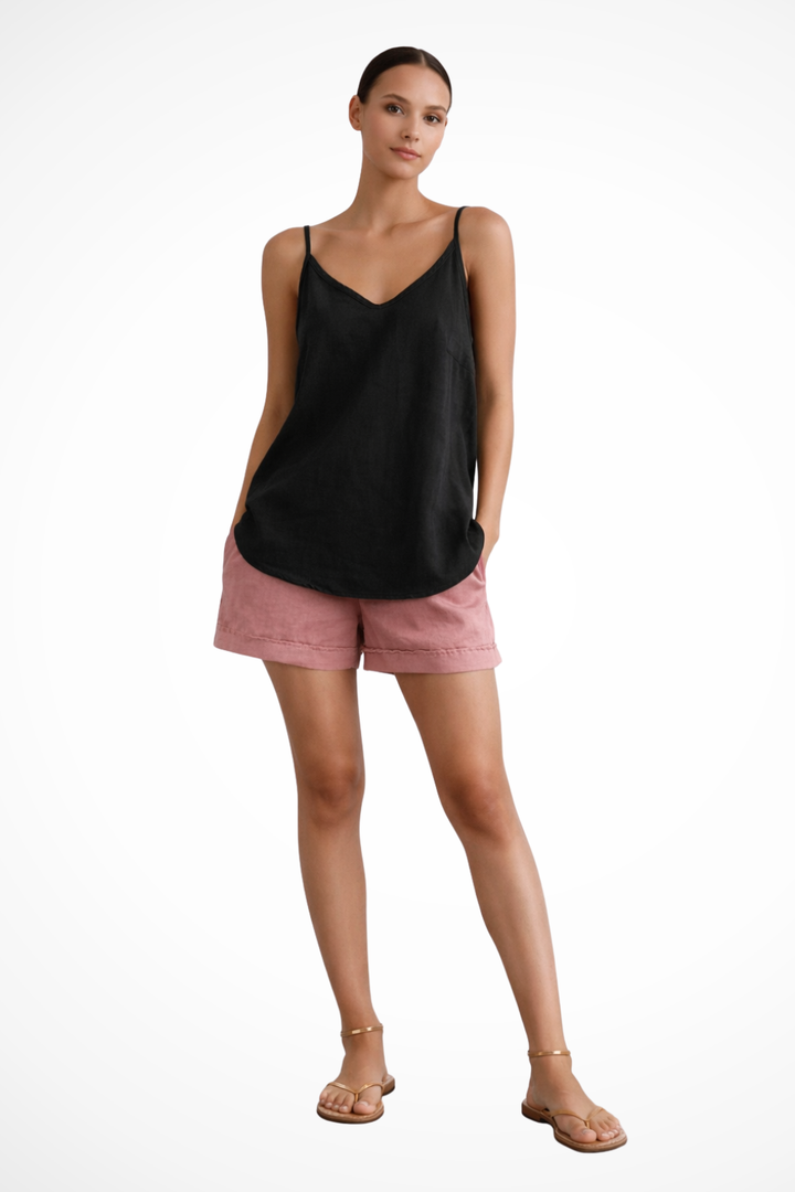Chic women's sleeveless spaghetti strap top, a versatile piece for elegant summer and spring outfits.