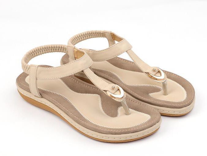Women's chic T-strap sandals with cushioned sole and elastic back for comfortable everyday summer wear.