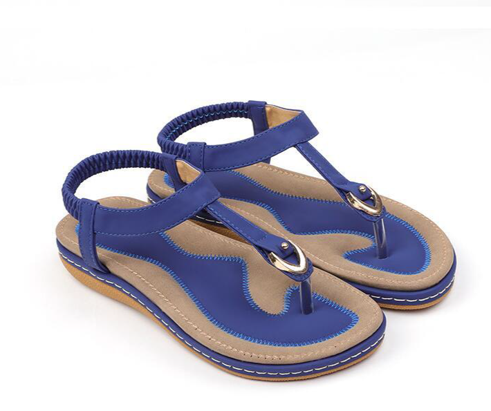 Elegant women's T-strap sandals featuring a soft cushioned insole and flexible elastic ankle strap.