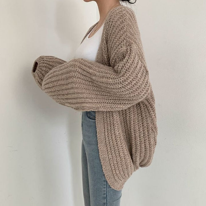Cozy women's chunky knit cardigan, relaxed fit with balloon sleeves. Ideal comfort wear for fall & winter.