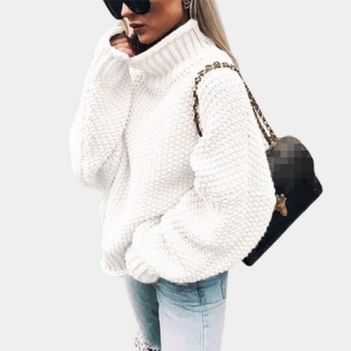 Women's chunky knit high neck sweater in relaxed fit, perfect for spring casual wear and modern style.