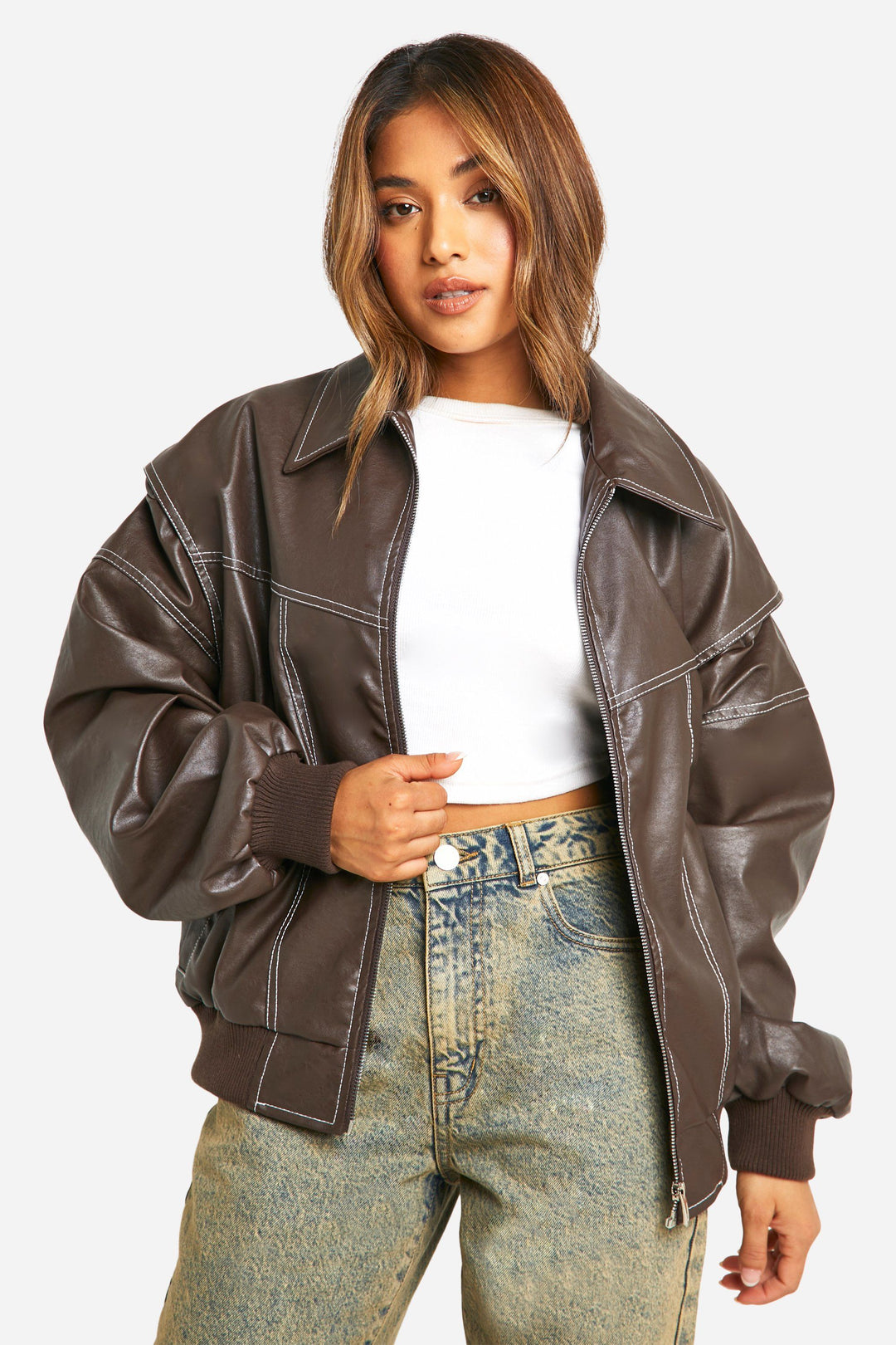 Women's classic faux leather bomber jacket in navy blue, clean design, essential outerwear