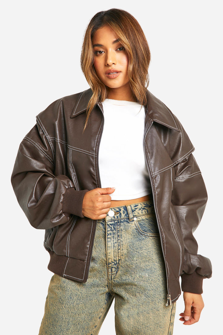 Women's classic faux leather bomber jacket in navy blue, clean design, essential outerwear