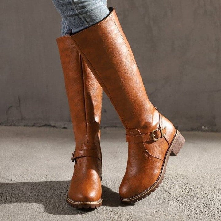 Women's classic black knee-high buckle boots, elegant fall fashion with comfortable support