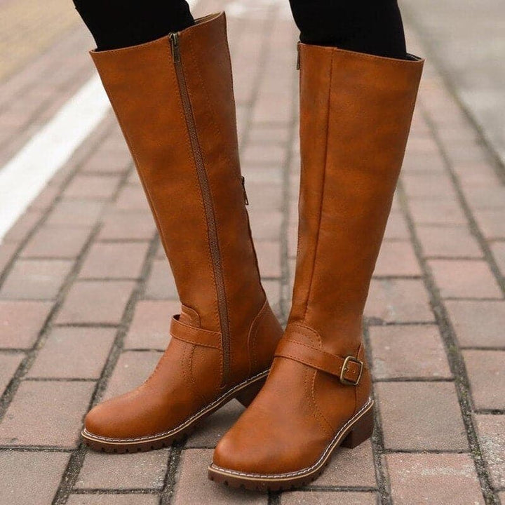 Knee-high women's boots with decorative buckles, versatile and comfortable for all-day wear