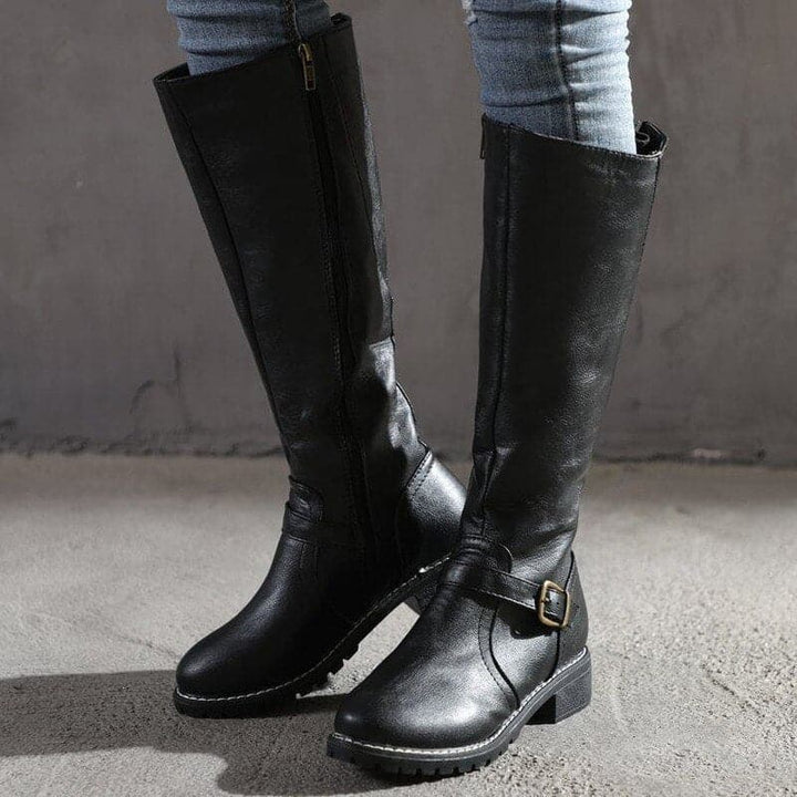 Elegant women's classic knee-high boots featuring chic buckle details for fall fashion