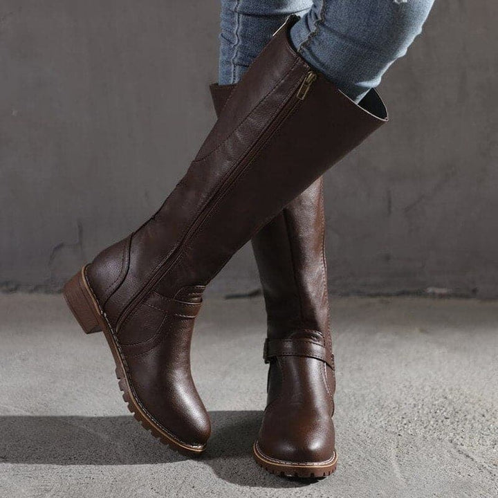Comfortable women's knee-high buckle boots, essential footwear for fall and winter style