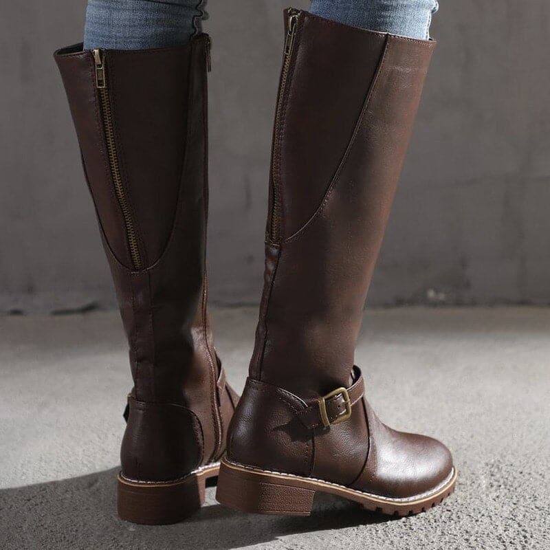 Sophisticated women's black knee-high boots with buckles, ideal for a refined classic look