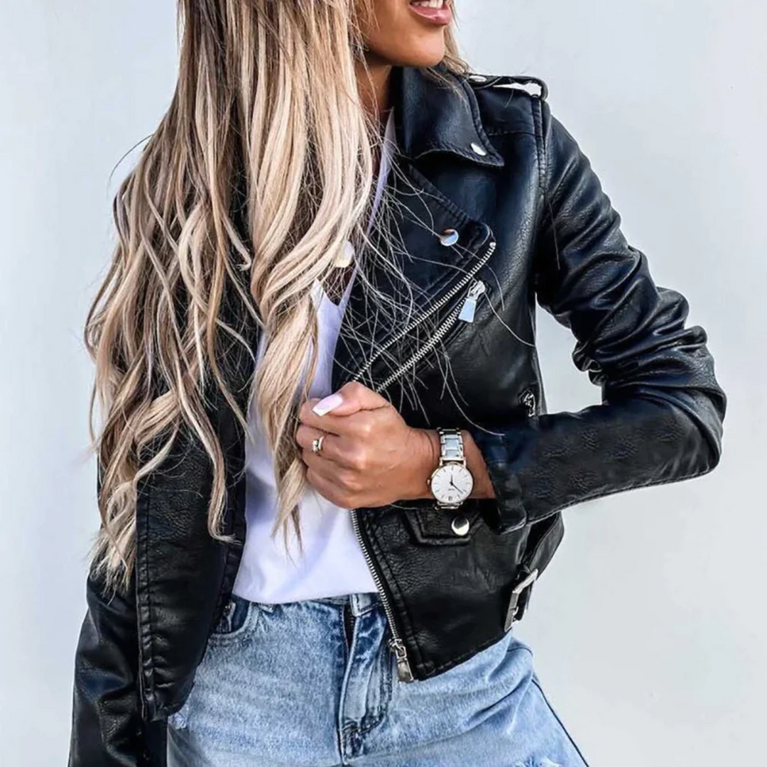 Women's classic black leather biker jacket with prominent zipper, perfect for casual street style outerwear.