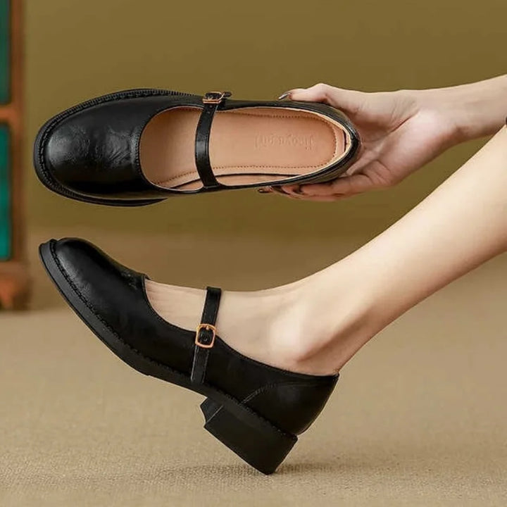 Brown leather Mary Jane flats for women, classic style with buckle, suitable for everyday wear