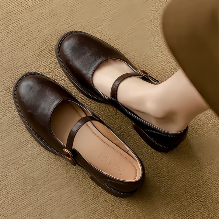 Comfortable women's black leather Mary Jane flats, block heel and adjustable buckle strap