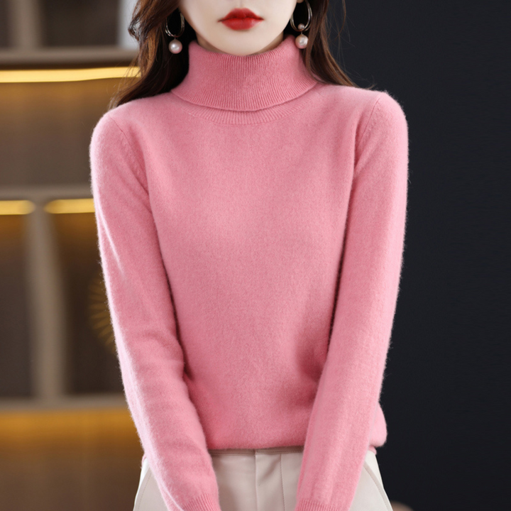 Hanging women's classic white turtleneck sweater, soft knit texture visible