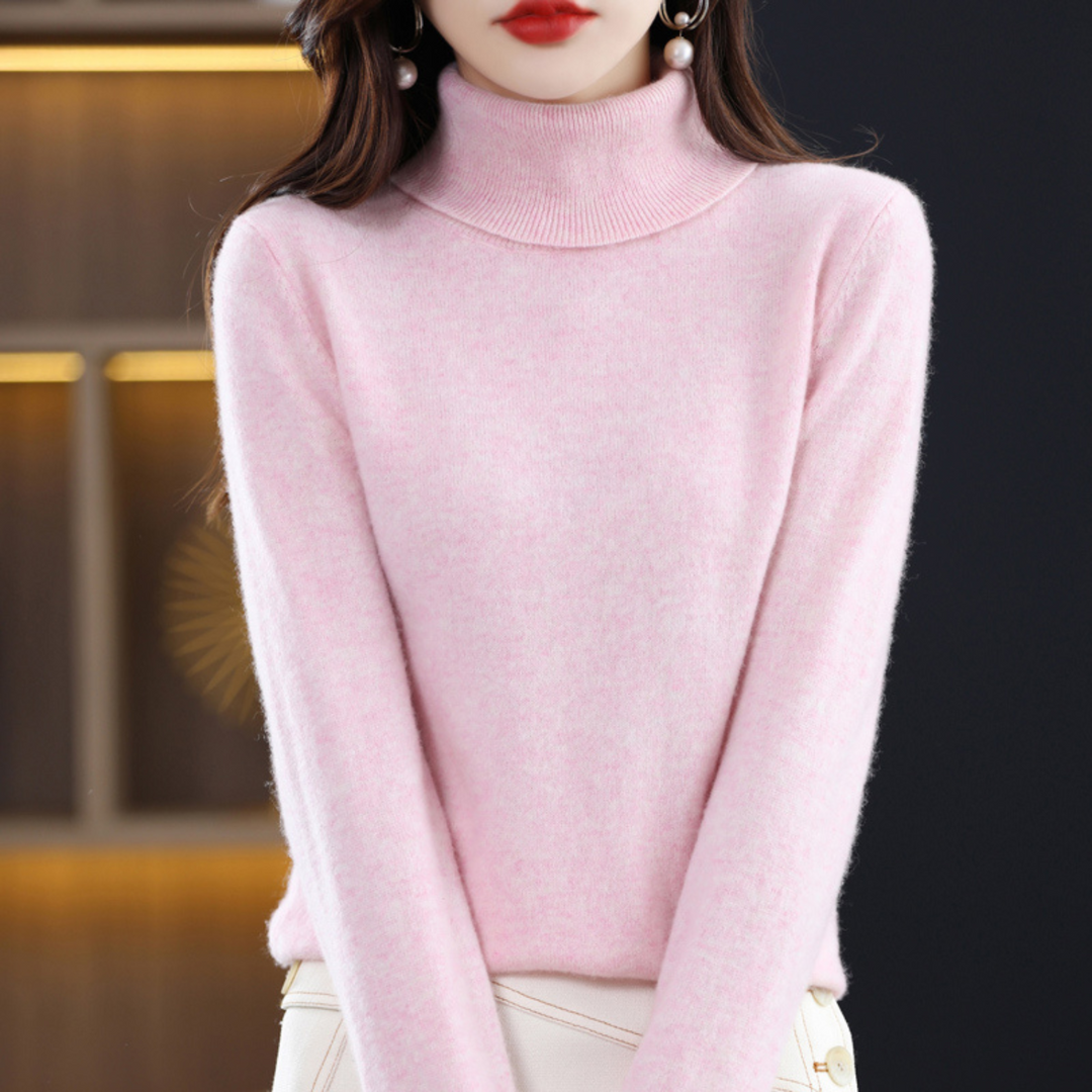 Detail shot of the ribbed knit collar of a women's fashion turtleneck sweater