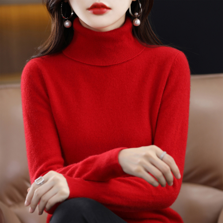 Woman enjoying a coffee while wearing a comfortable green knit turtleneck pullover