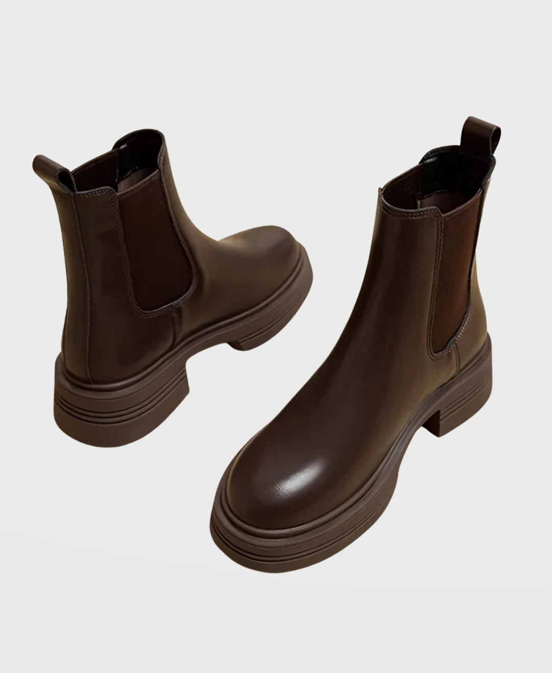 Comfortable women's slip-on Chelsea ankle boots with sturdy block heel, versatile for fall & winter fashion.