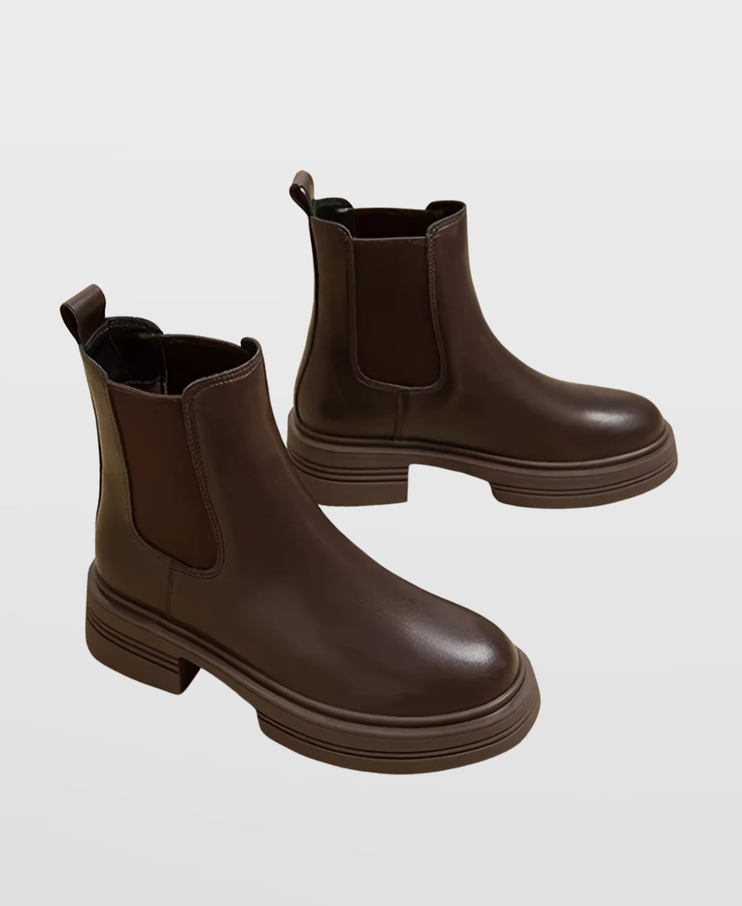 Women's classic coffee Chelsea ankle boots featuring a comfortable block heel and practical slip-on design.