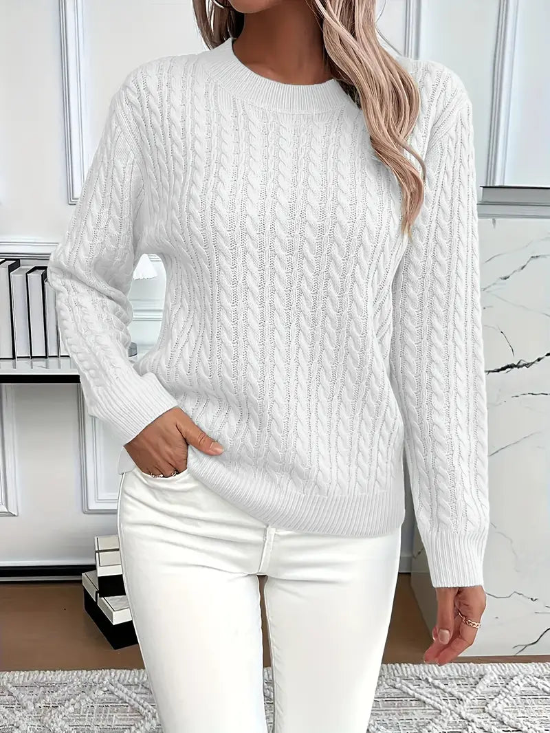 Women's classic cream cable knit jumper, soft, warm, and comfortable for everyday wear.