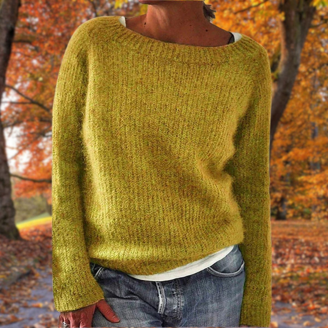 Women's classic elegant knit sweater, timeless design for winter warmth & autumn style. Cozy long-sleeve pullover.