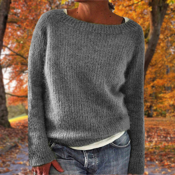 Cozy women's classic knit sweater, a warm long-sleeve pullover for comfortable autumn & winter fashion.