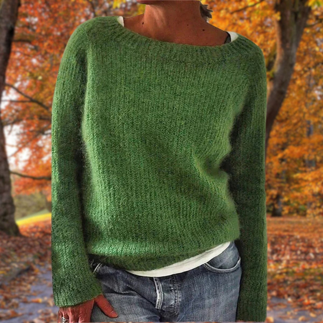 Elegant women's classic knit sweater, a warm long-sleeve top for sophisticated winter & autumn outfits.