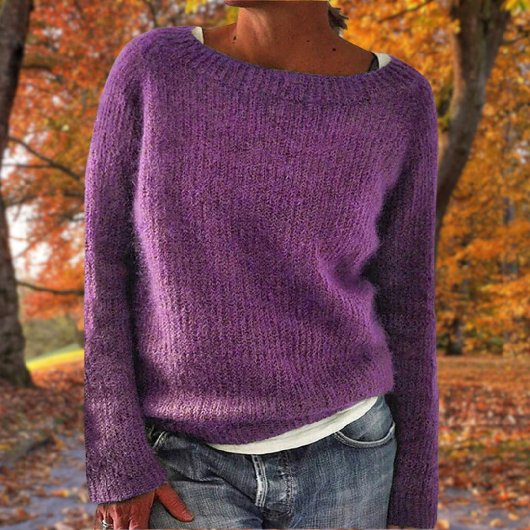 Women's classic knit sweater offering timeless warmth & elegant style. A versatile long-sleeve pullover for winter fashion.