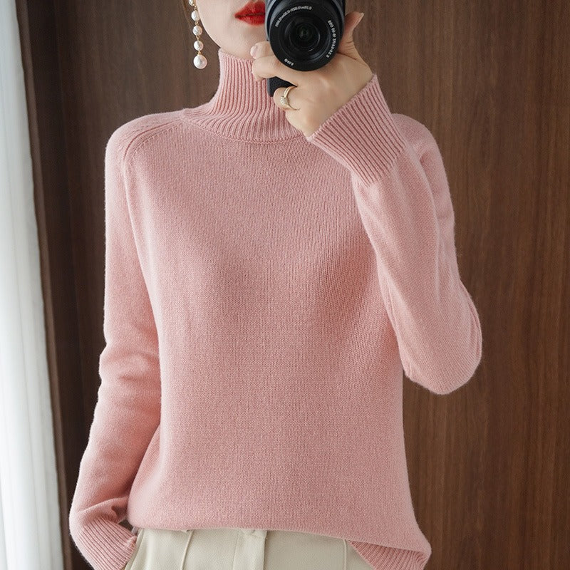 Women's classic fit smooth turtleneck sweater, perfect for comfortable everyday wear or elegant workwear.
