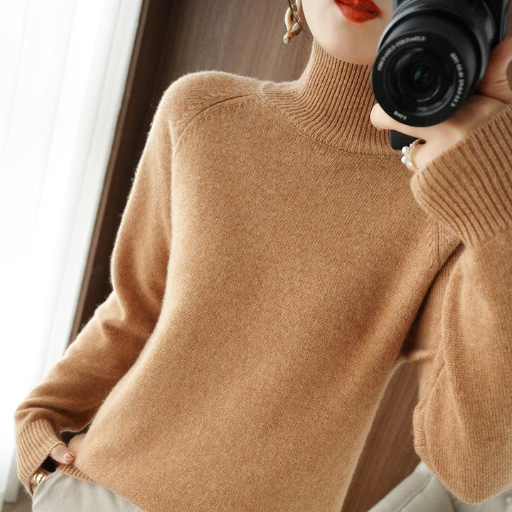 Comfortable women's classic fit turtleneck sweater, a must-have long sleeve pullover for fall workwear style.