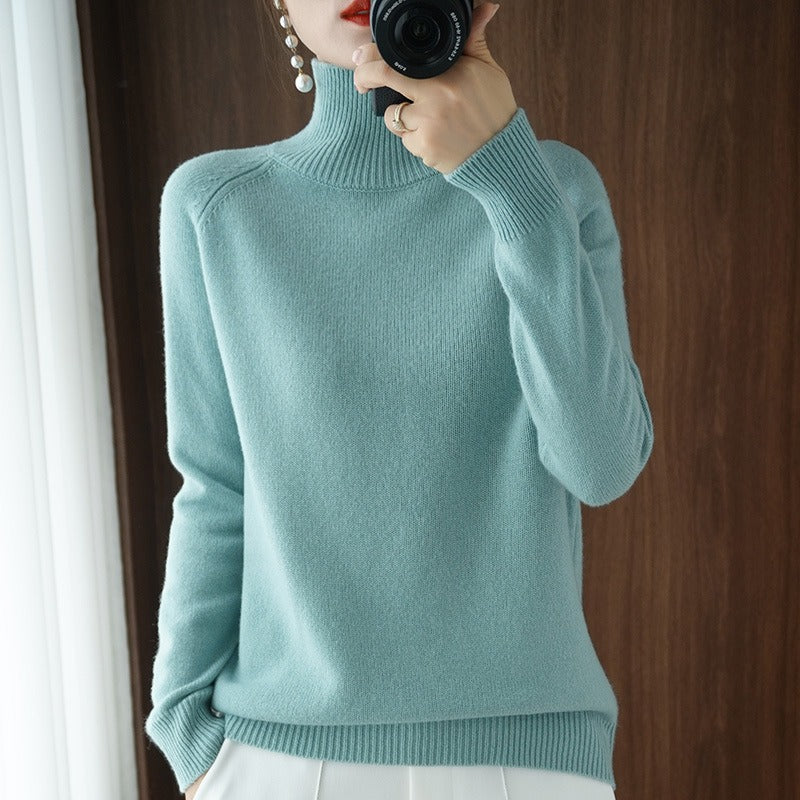 Classic women's long sleeve turtleneck pullover, an elegant and versatile sweater for any occasion.