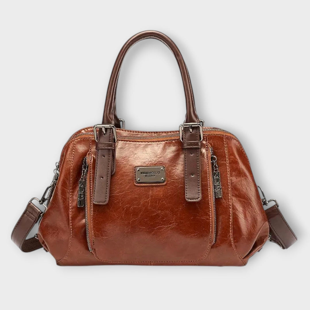 Brown women's everyday carry handbag, a versatile fashion accessory for shoulder & crossbody use