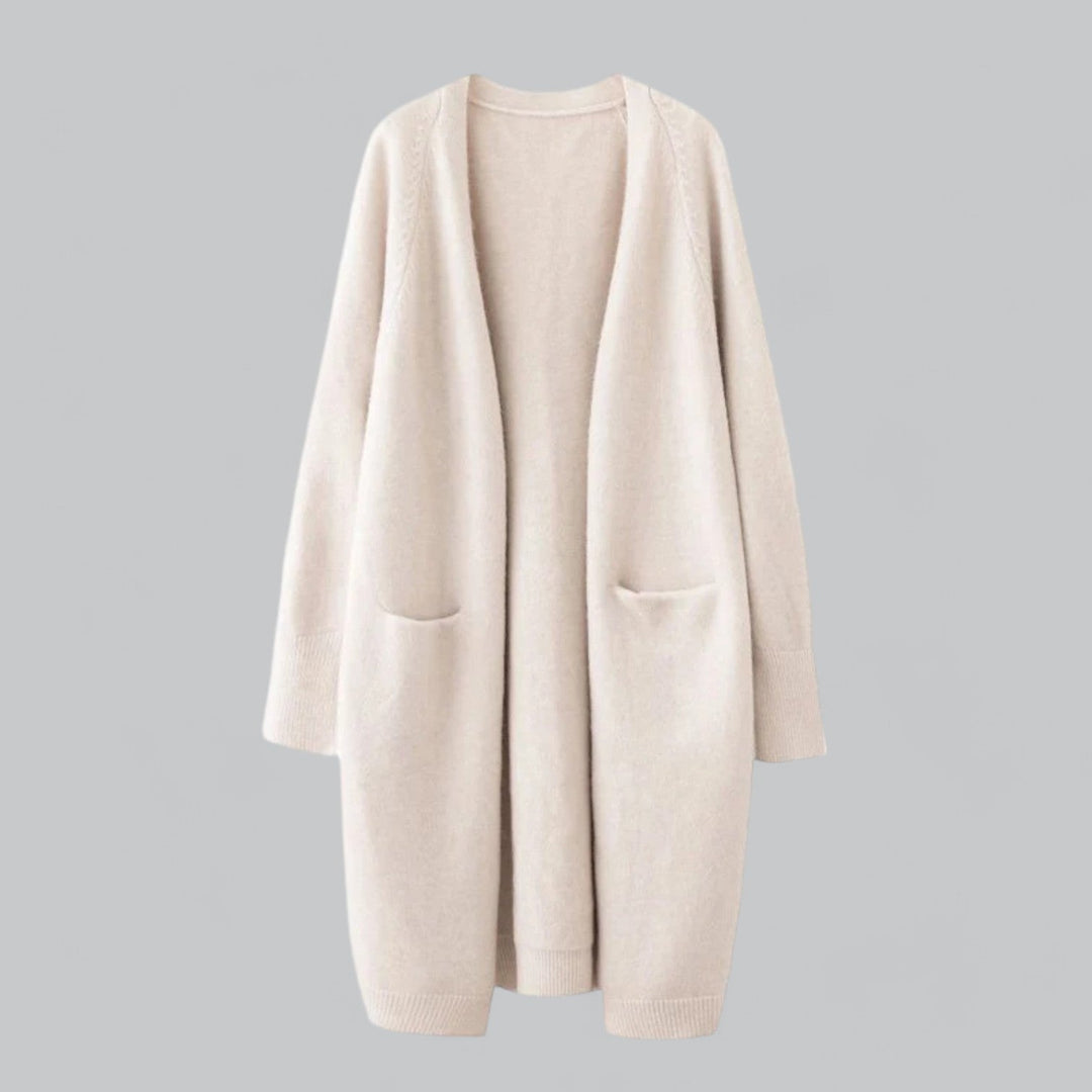 Cozy women's long knit cardigan, ideal for comfortable layering & versatile winter fashion.