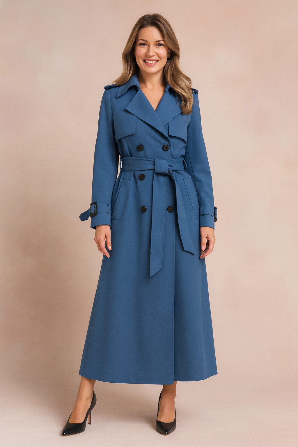 Stylish women's long trench coat featuring an adjustable belt & buckle details. Perfect for fall & spring fashion.