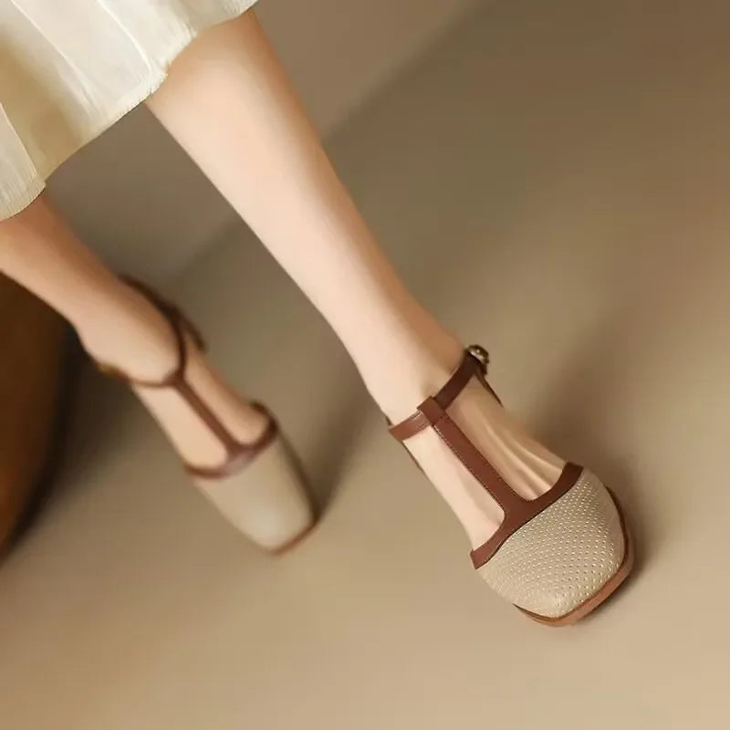 Classic women's t-strap shoes, perforated design and square toe, mid-heel elegance