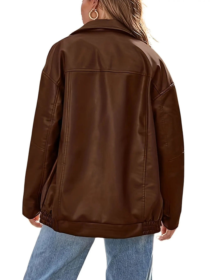 Back view of a women's casual oversized leather bomber jacket, ideal for everyday outerwear