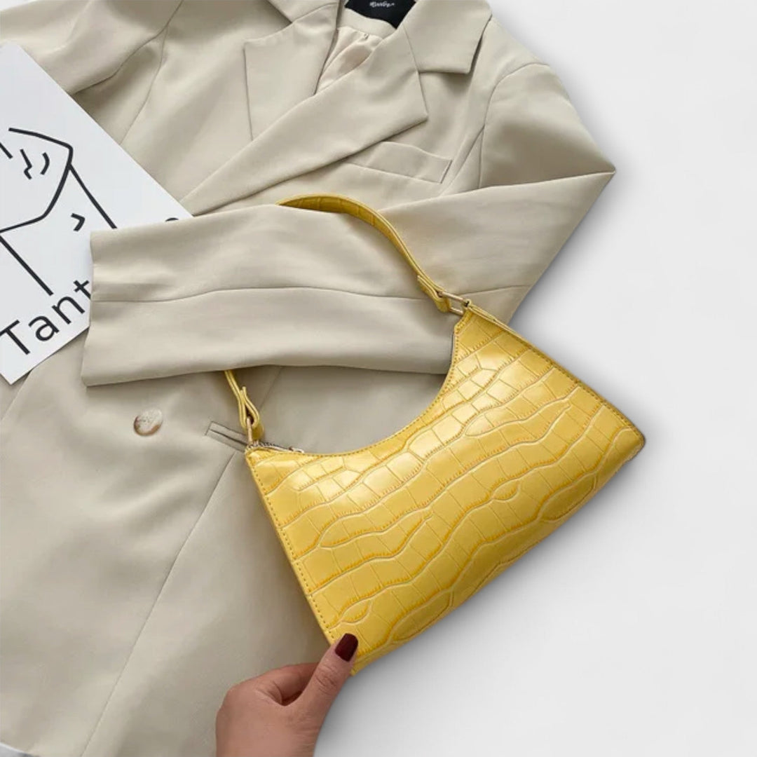 Vibrant Women's Shoulder Bag, iconic and classic, functions as a crossbody or handbag, fashion essential