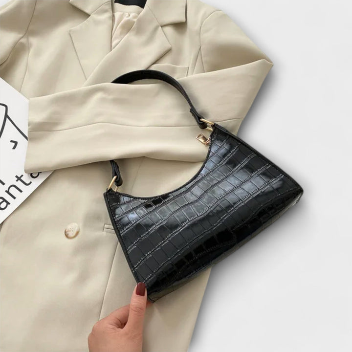 Women's Iconic Shoulder Bag, rich color, can be a crossbody or handbag, essential for summer fashion