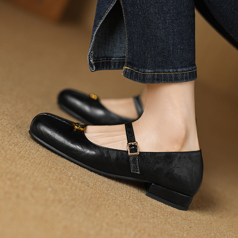 Pair of women's comfort ballet flats featuring a classic strap design, versatile footwear.