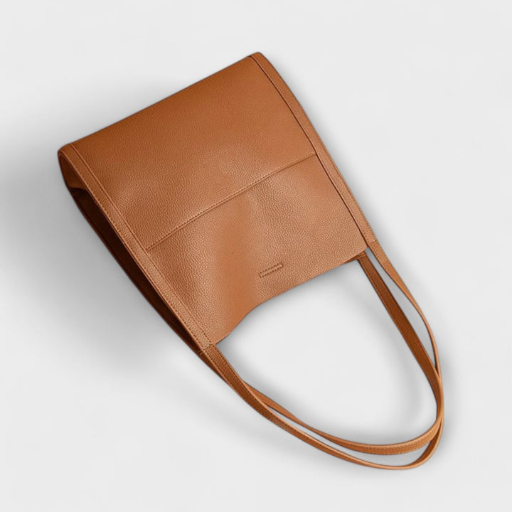 Women's classic structured shoulder handbag with a removable strap, a versatile fashion accessory.