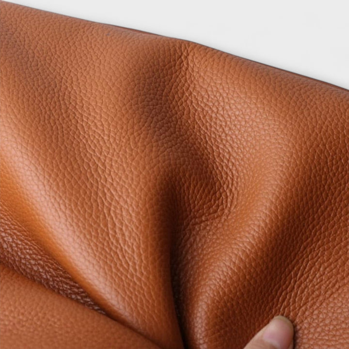 Interior shot of women's structured handbag, showcasing ample space for essentials.