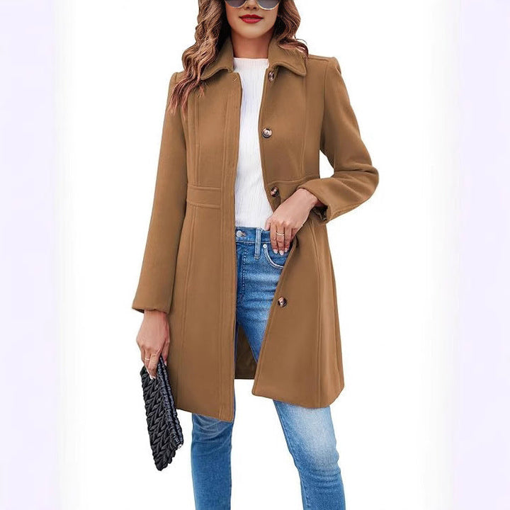 Elegant women's trench coat, button-down design with functional details. Ideal stylish fall/winter outerwear.