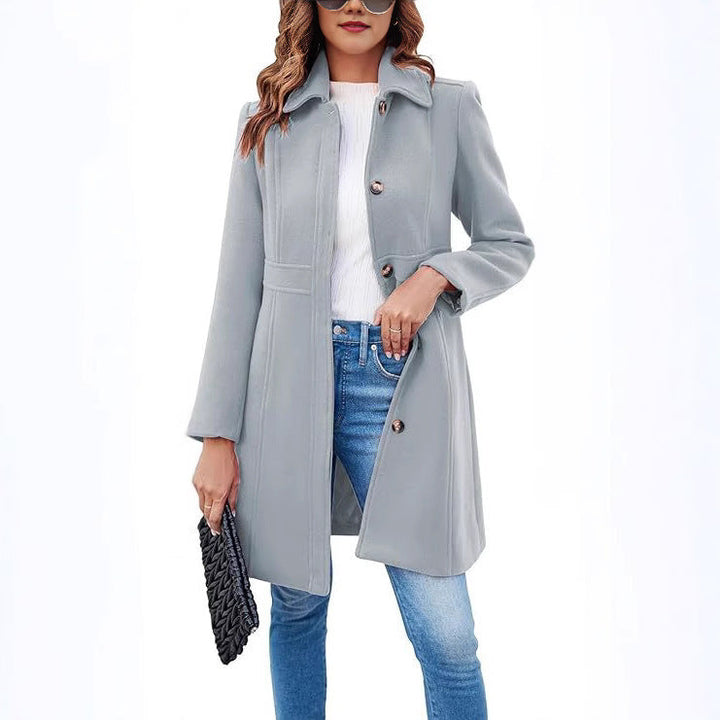 Stylish women's long trench coat, classic design with a modern cut for elegant fall and winter fashion.