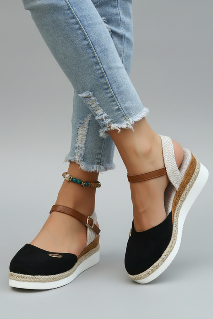 Women's summer espadrille sandals featuring a closed-toe and comfortable wedge heel