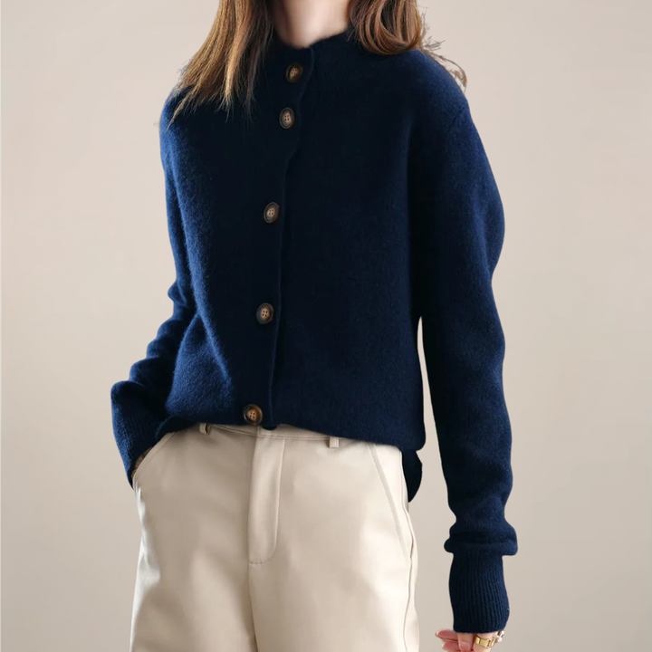 Close-up of a women's collared button-front cardigan, ideal as a spring layering piece.
