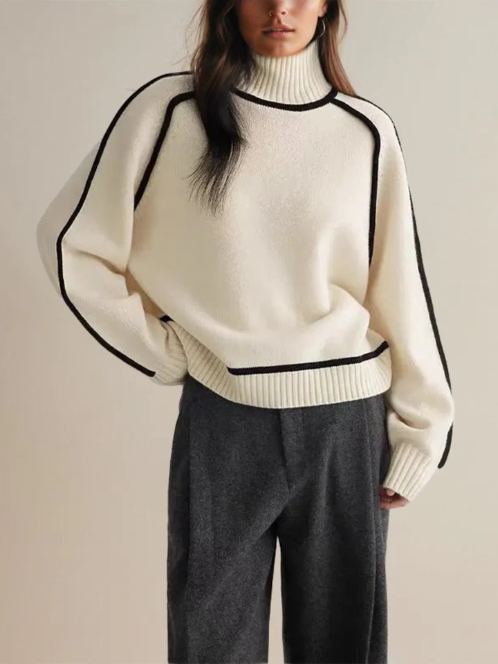 Women's color block turtleneck sweater in cozy knit, ideal for winter fashion and casual wear.