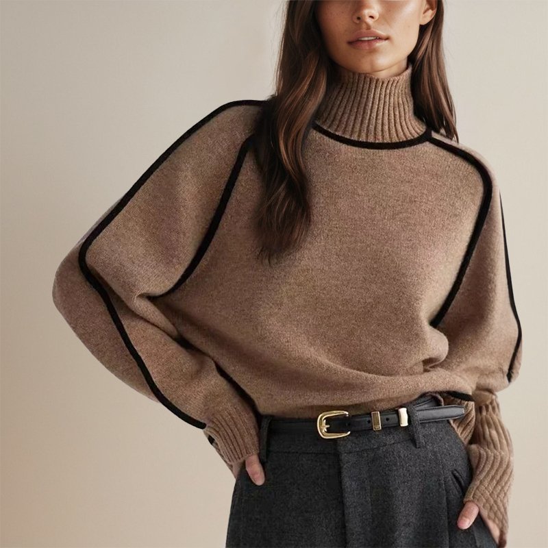 Stylish women's color block turtleneck sweater with long sleeves, perfect for cold weather.