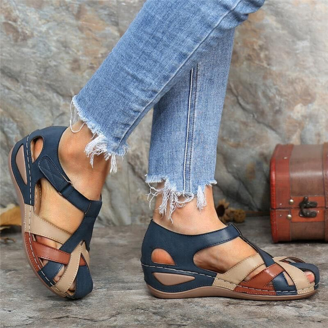 Stylish women's closed toe sandals with a vibrant colorblock design, perfect for casual wear and spring fashion.