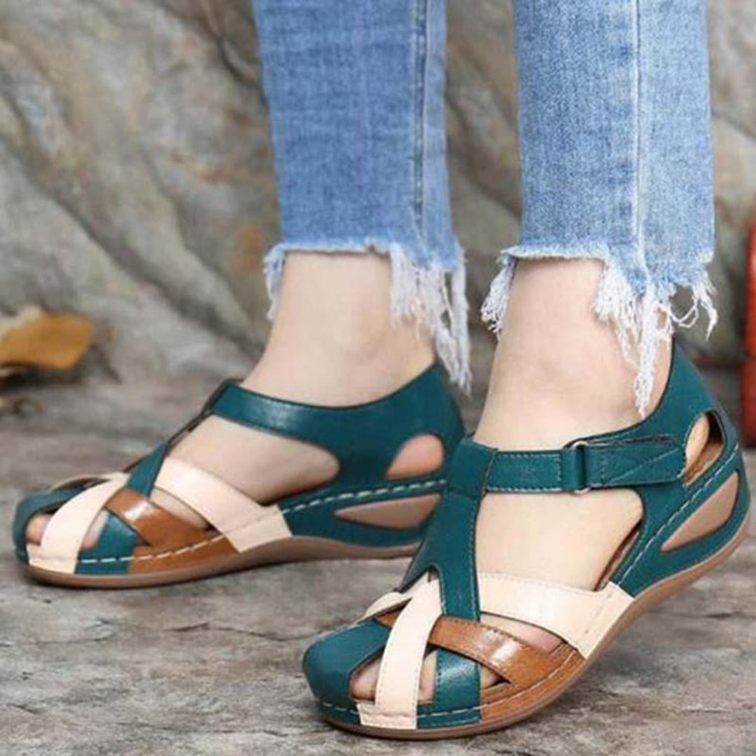 Comfortable women's colorblock closed toe slip-on sandals, a versatile and stylish addition to spring and summer footwear.
