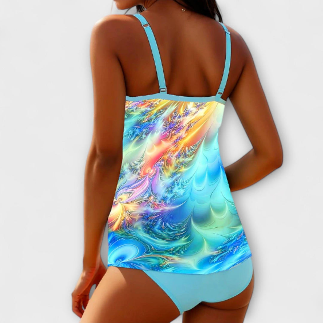 Vibrant women's tankini set with a unique print, ideal for poolside and vacation outfits.